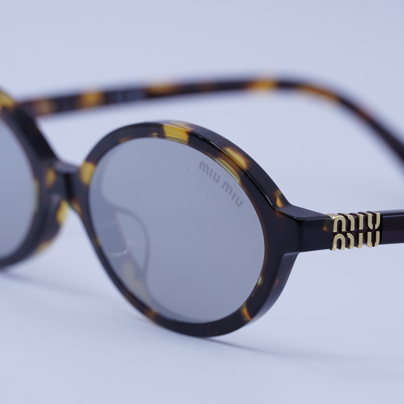 Miu Miu MU04ZSF Oval Sunglasses