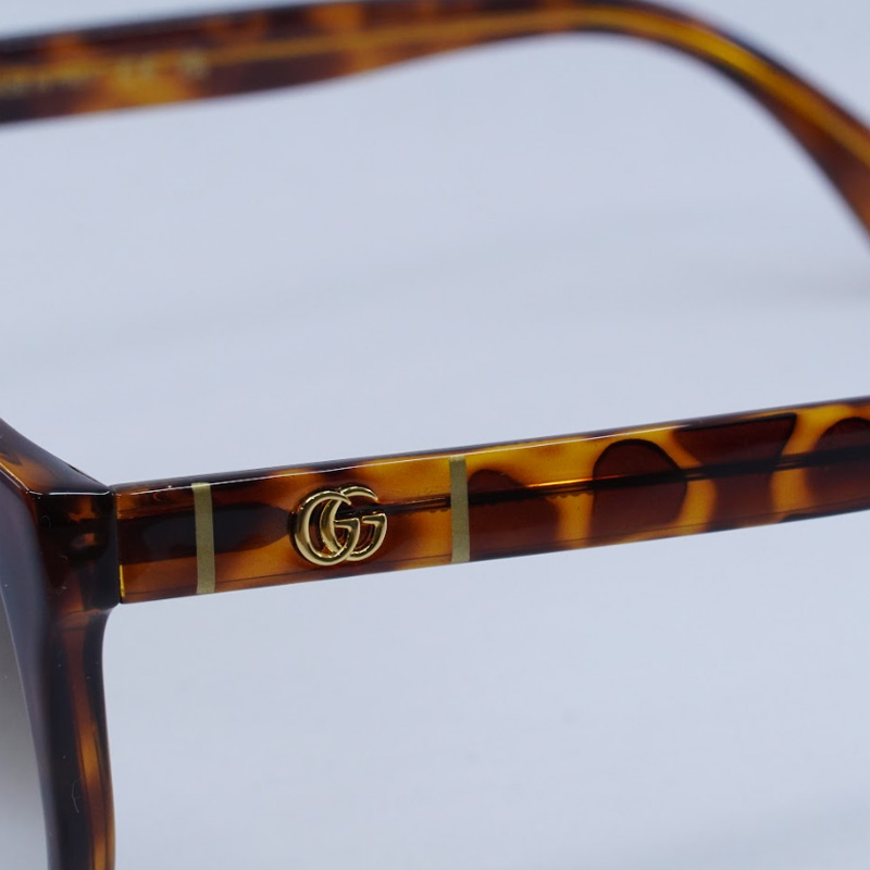 Gucci GG0631S Round Sunglasses